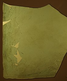 Fragment of a Roman window glass plate dated to 1st to 4th century CE Roman window glass.jpg