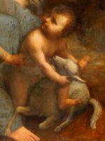 Gros plan sur l'Enfant jouant avec l'agneau.