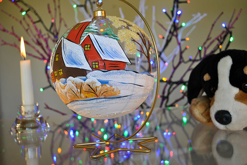 File:See through painted Christmas bauble on stand.jpg