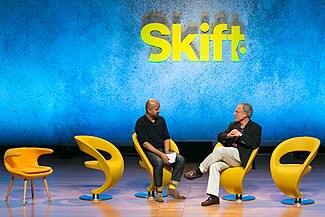 Skift CEO Rafat Ali interviews TripAdvisor CEO Stephen Kaufer at the Skift Global Forum 2016. Skift CEO Rafat Ali interviews TripAdvisor CEO Stephen Kaufer.jpg