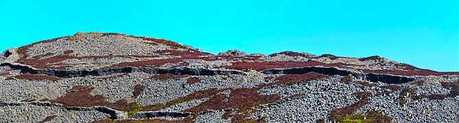 Tre'r Ceir (best preserved hillfort in Europe, built 200 BC) from Garn Ganol; April 2022 22.jpg