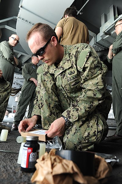 File:U.S. Navy Explosive Ordnance Disposal (EOD) Technician 2nd Class Scott Carlson, assigned to EOD Mobile Unit 11 sets up for a demolition buildup aboard the aircraft carrier USS Nimitz (CVN 68) in the South China 130521-N-ZG290-406.jpg
