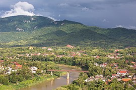 View from Mount Phou Si with the old French bridge over the Nam Khan river in Luang Prabang Laos
