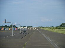 The former runway of Naval Air Warfare Center Warminster is now part of Warminster Community Park and contains basketball courts and a children's area called Safety Town