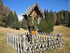 Wayside cross on the Salten in Vöran, South Tyrol, Italy.