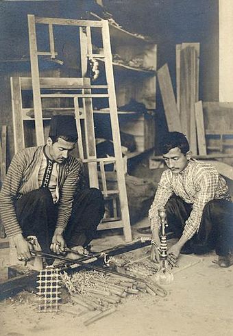 Damascene woodworkers turning wood for Mashrabiya and hookahs, 19th century
