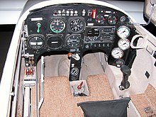 Cockpit. Engine on-off switches on left side panel are placarded "FWD - LOUD; BACK - QUIET" Xcor-ezrocket-N132EZ-040928-03-16.jpg