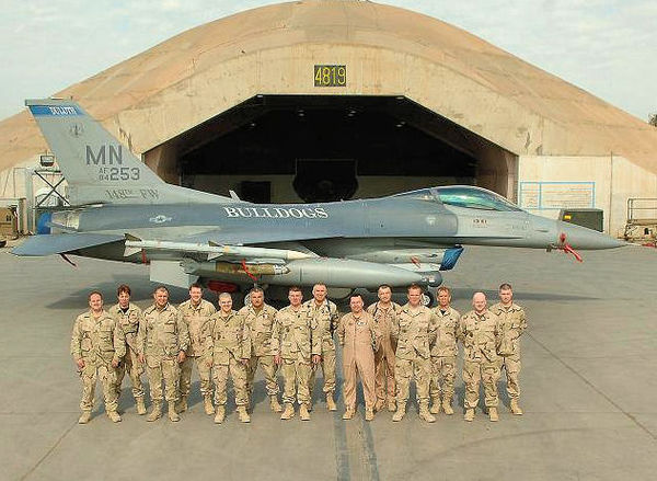 In front of F-16C block 25 #84-1253 from the 179th Expeditionary Fighter Squadron, Minnesota ANG, airmen pose for a 'family' photograph at Balad AB, o