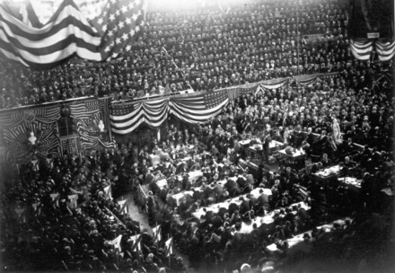 The Interstate Exposition Building (known as the "Glass Palace") during the convention; James A. Garfield is on the podium, waiting to speak.