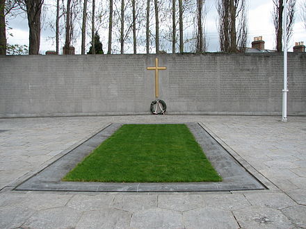 The burial spot of the leaders of the Rising, in the old prison yard of Arbour Hill Prison. The Proclamation of 1916 is inscribed on the wall in both Irish and English