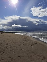 Lietus mākoņi Rīgas ziemeļos, Daugavgrīvas pludmalē, 2021. gada 4. septembrī.