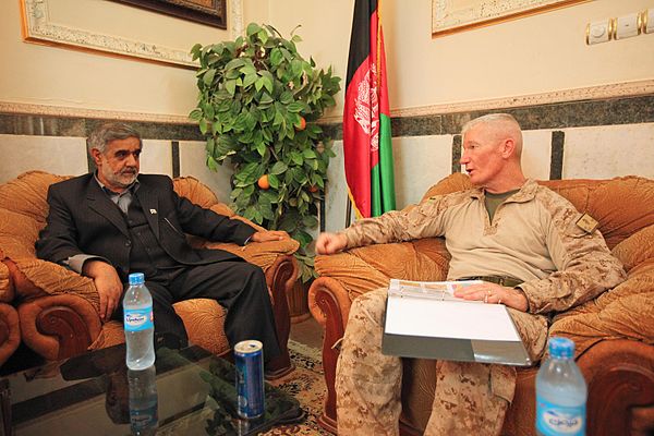 Former Governor General Abdul Karim Barahui and Maj. Gen. John A. Toolan, commanding general of Regional Command Southwest, discussing local issues in