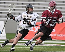 A lacrosse game between UMass and Army in 2012 Army vs. UMass lacrosse (6870247023) (cropped).jpg