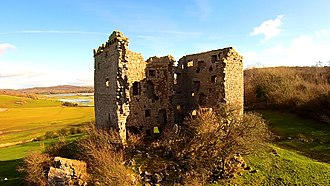 The northwestern side of the tower collapsed in the early 1900s. Silverdale Moss is visible in the background Arnside Tower, rear, Feb 2016.jpg