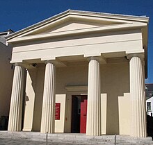 Four pillars support the front of the church