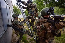 Marines during a Certification Exercise in a training village, in 2018 CERTIFEX Korps Mariniers 2018.jpg