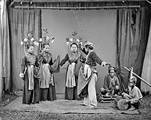Pajoge dancers and musicians in Sulawesi, circa 1870 COLLECTIE TROPENMUSEUM Danseressen en muzikanten te Gorontalo Noord-Celebes TMnr 10003460.jpg