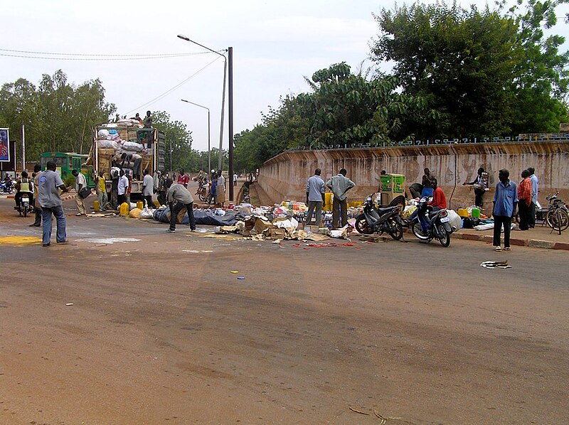 File:Cargo after falling out of a truck in Burkina Faso, 2009.jpg