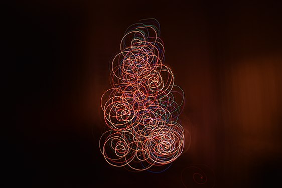 Christmas tree lights photographed with moving camera