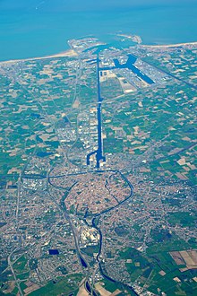 Aerial view of the Boudewijnkanaal canal linking Zeebrugge (top) with Bruges (middle) Cmglee Bruges Boudewijnkanaal aerial.jpg