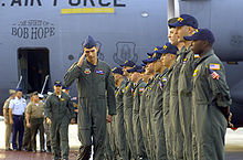 The EP-3 crew arrives at Hickam AFB in Hawaii. (Pictured saluting is U.S. Air Force Senior Airman Curtis Towne.)