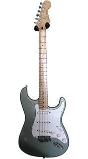 The Fender Stratocaster, colloquially known as the Strat, is a model of electric guitar designed from 1952 into 1954 by Leo Fender, Bill Carson, George Fullerton and Freddie Tavares. The Fender Musical Instruments Corporation has continuously manufactured the Stratocaster from 1954 to the present. It is a double-cutaway guitar, with an extended top 