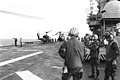 Flight operations take place aboard the amphibious assault ship USS GUAM (LPH 9) off the coast of Grenada during Operation URGENT FURY. Visible on the flight deck is a UH-1N Iroquoi - DPLA - 7decd705d4e4c17d760e9549a89290f6.jpeg