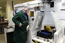 Packaging radioactive pharmaceuticals at GE HealthCare's facility in Amersham, England GE Healthcare Amersham radiopharmaceuticals packaging.jpg