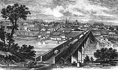 View across the first Gay Street Bridge in the late 1860s; the bridge shown was eventually destroyed by a flood Gay-street-bridge-1860s-tn1.jpg