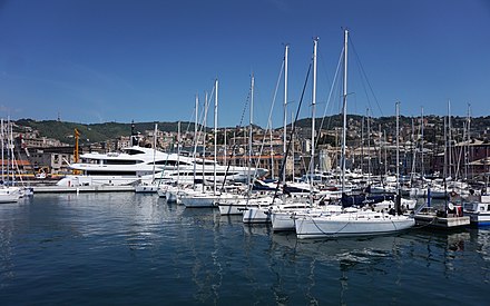 The busy city port, filled to the brim with yachts, boats, cruises, ferries and cargo ships. Genoa is a very important sea town in the Mediterranean.