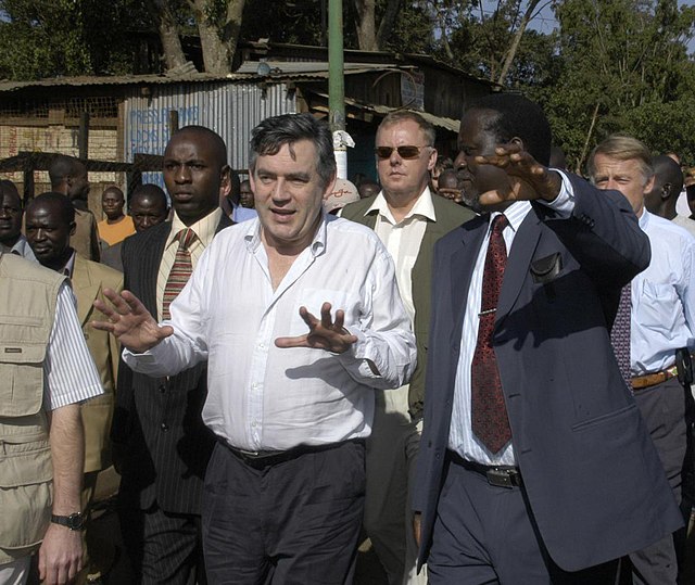 Odinga with Gordon Brown at Kibera