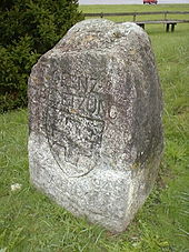 This stone inscribed "frontier defence 1939-1945" stands between the airbase and the Lutschine river Grenz-besetzung 029533.jpg