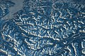 die Täler und schneebedeckten Berge in den Alpen, ein Blick von der ISS