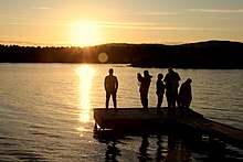 In the middle of summer, the sun can appear even at midnight in the northern hemisphere. Photo of midnight sun in Inari, Finland. Inari, Finland - panoramio (5).jpg