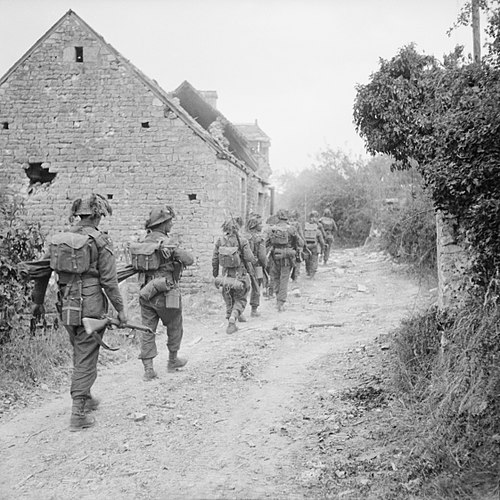 Infantrymen of the Hallamshire Battalion, York and Lancaster Regiment in the village of Fontenay-le-Pesnel, Normandy, France, 25 June 1944.