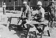 Germans building barracks in an internment camp during World War I Interned Germans World War I.jpg