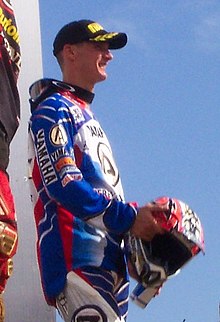 Everts on the MX1 podium at the 2004 British GP (Arreton, IOW) Iow gp 2004 podium mx1 no072 stefan everts 01 jamie clarke.jpg