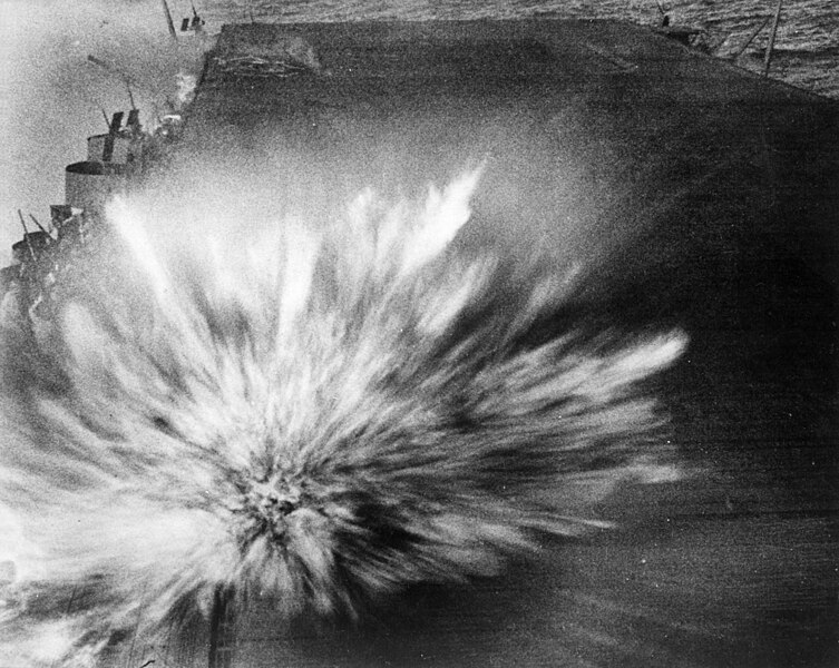 File:Japanese bomb hits USS Enterprise (CV-6) flight deck during Battle of the Eastern Solomons, 24 August 1942 (80-G-17489).jpg