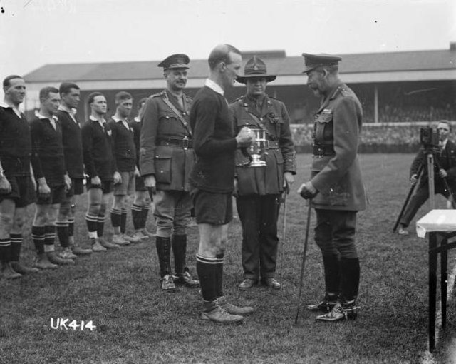 James Ryan, captain of the New Zealand Army team, receiving the Kings Cup from George V