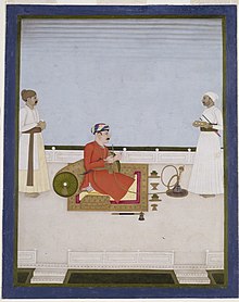 Miniature painting of Gurgin Khan, the Armenian general of Nawab Mir Qasim, seated smoking on a terrace, with two servants, ca.1760-63 King Gurgin Khan.jpg