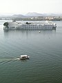 Lake palace, and guest ferry boat on Lake Pichola.