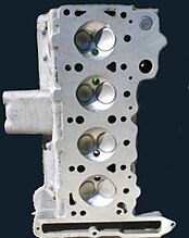 Lotus "big valve" head with hemispheric chambers Lotus Hemi BigValve Chambers.jpg