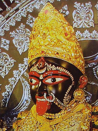 In Bengal and Odisha, Kali's extended tongue is widely seen as expressing embarrassment over the realization that her foot is on her husband's chest.[19]: 53–55 [24][25][5]: 237 