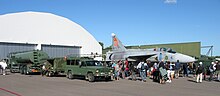 A Viggen aircraft and service vehicles lined up according to the Bas 90 principle of mobile flight line operations, here on public display Malmen2016 15 - JA37 Viggen.jpg