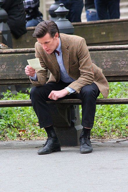 Matt Smith during filming of the episode in Central Park, New York, part of the final scene where the Doctor reads Amy Pond's afterword.