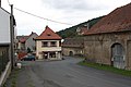 Čeština: Hlavní silnice procházející vsí Milešov (obec Velemín). Okres Litoměřice, Česká republika. English: Main road in Milešov village (Velemín municipality), Litoměřice District, Czech Republic.