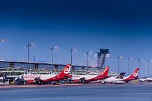 Apron overview with most planes visible of the since-defunct Air Berlin which formerly maintained a hub in Nuremberg. Morgenstimmung am Airport Nurnberg.jpg