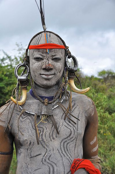 File:Mursi Warrior, Ethiopia (11886392523).jpg