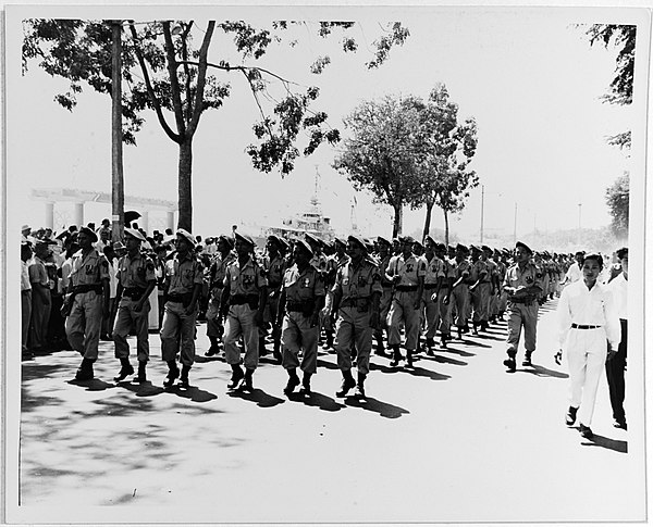 First Marine battalion marches through Saigon, October 1956