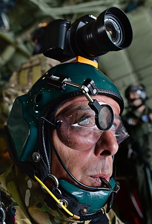 Paratrooper Cpl Ian Chapman prepares to jump from a C-130J Super Hercules